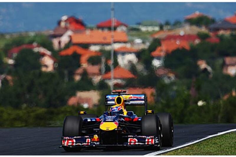 Mark Webber drives during practice at the Hungaroring. The Australian won his maiden grand prix last time out in Germany.