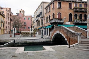 A square is seen virtually deserted in Venice as the Italian government continues restrictive movement measures to combat the coronavirus outbreak, in Venice, Italy. Reuters