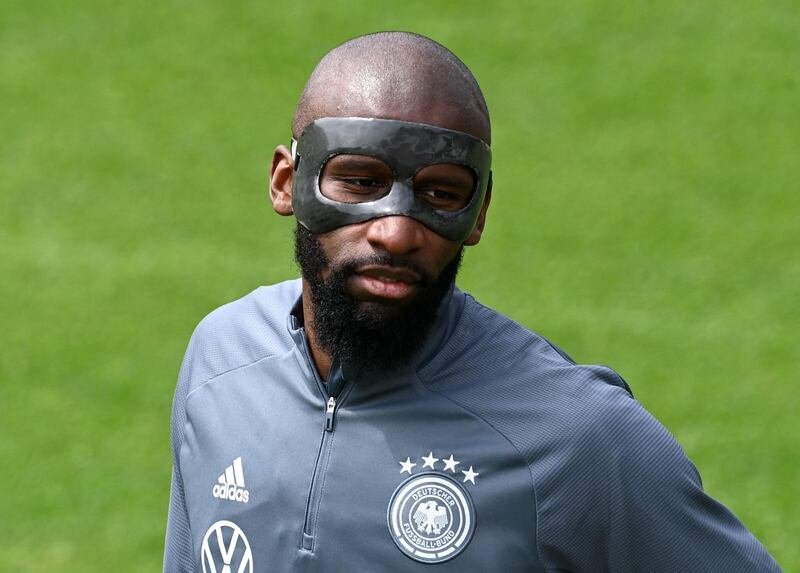 Germany's defender Antonio Rudiger wears a protective mask. AFP