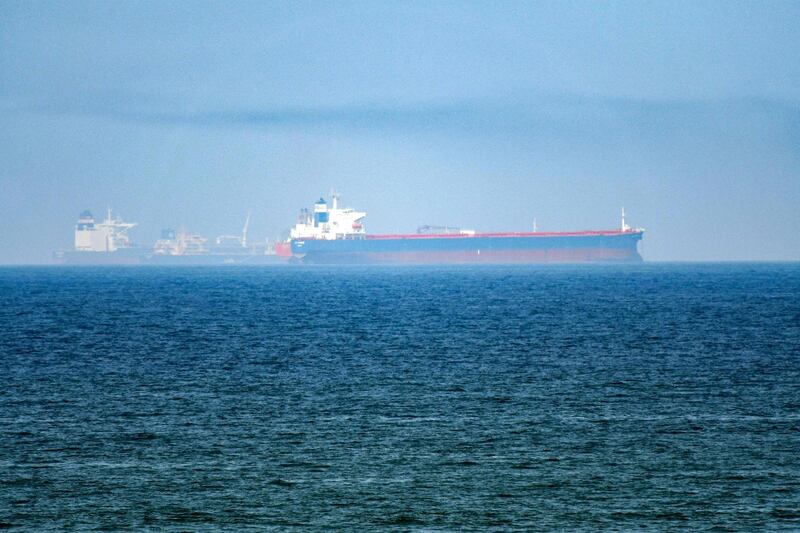 TOPSHOT - This picture taken on June 15, 2019 shows tanker ships in the waters of the Gulf of Oman off the coast of the eastern UAE emirate of Fujairah.  / AFP / GIUSEPPE CACACE
