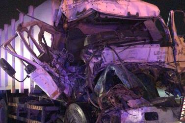 The mangled wreckage of a rubbish collection truck on Sheikh Mohamed bin Zayed Road early on Tuesday. Courtesy: Dubai Police