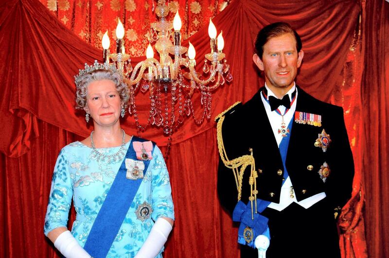 FBHAWW Hong Kong, China:  Madame Tussaud's Museum wax figures of Britain's Queen Elizabeth and Prince Charles