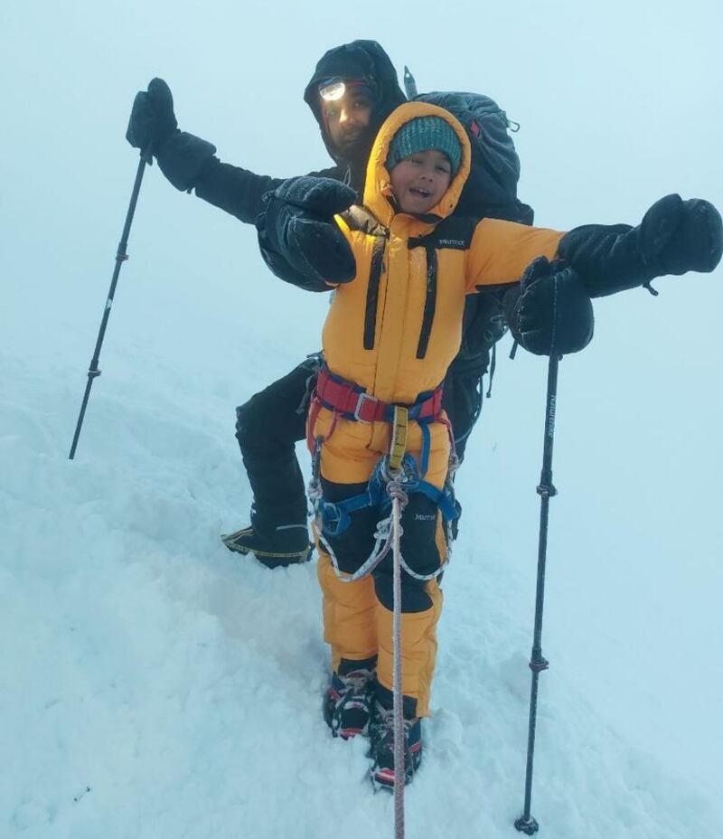Ayaan Saboor Mendon and his father, Saboor Ahmad, are in jubilant form as they reach the summit of Mount Elbrus. Photo: Vani Mendon