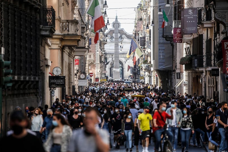 People walk in via del Corso, downtown Rome, Italy. EPA