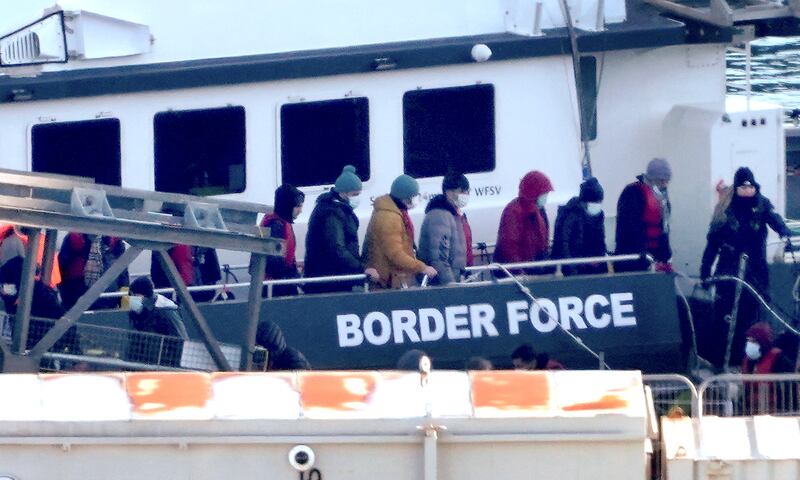 A group of people thought to be migrants are brought to Dover, Kent, on board a Border Force vessel following a small boat incident in the Channel. PA