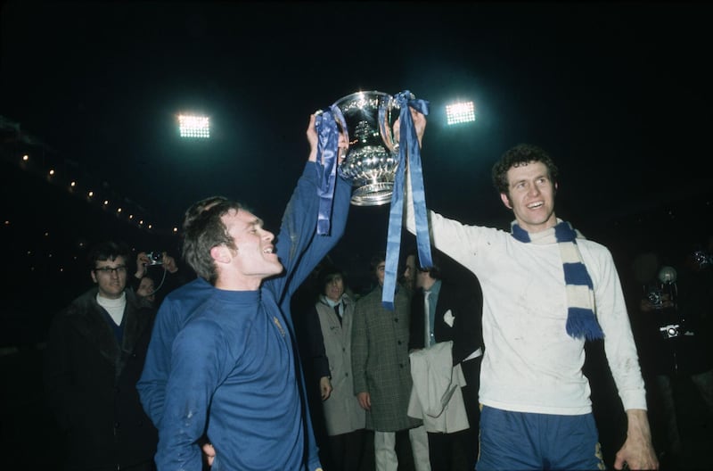 29th April 1970:  Chelsea's Ron Harris (left) and Peter Osgood lift the FA Cup trophy in celebration after beating Leeds United 2-1 in the FA Cup Final replay at Old Trafford.  (Photo by Express/Express/Getty Images)