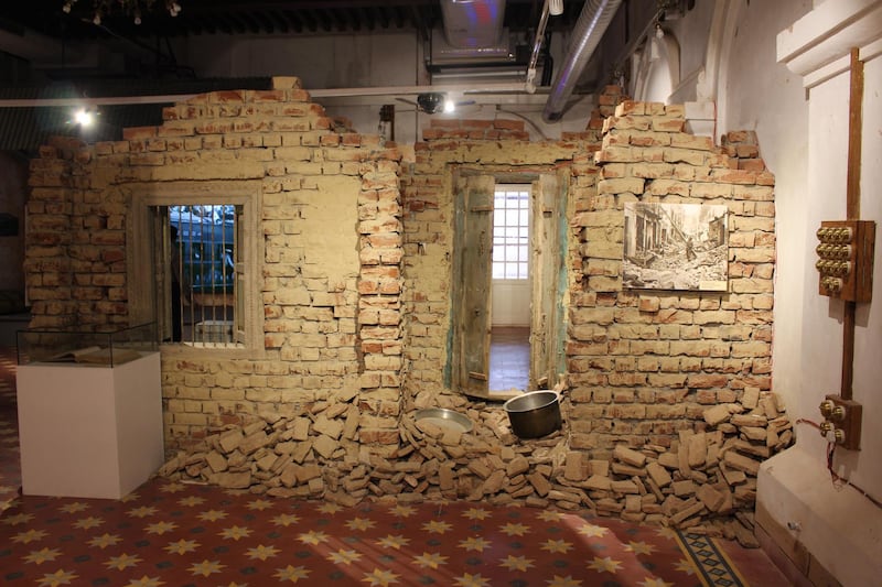 An installation representing a riot-hit house.Partition Museum