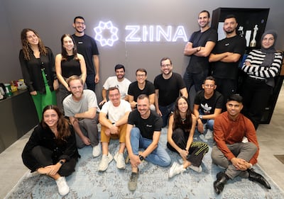 Mr Toukan and Mr Gold, with Ziina's team at their office in DIFC. Chris Whiteoak / The National