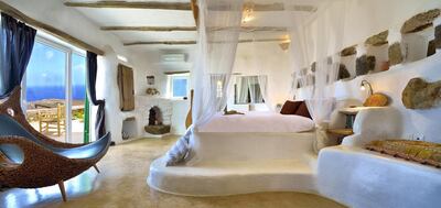 The master bedroom at Residence MK0417, listed by Algean Property in Lia Bay, Mykonos  