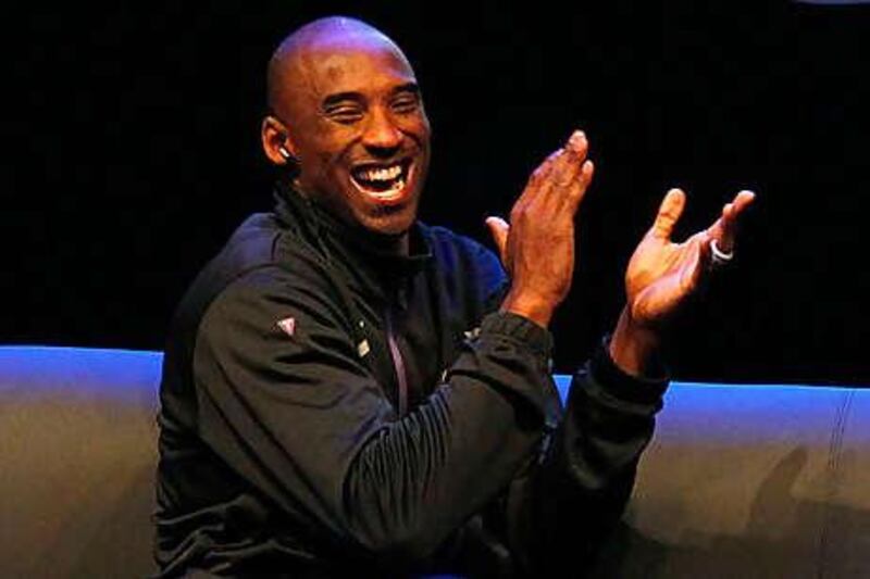 Kobe Bryant on a five-city tour of China where he sells more replica shirts than the country's own NBA star Yao Ming.