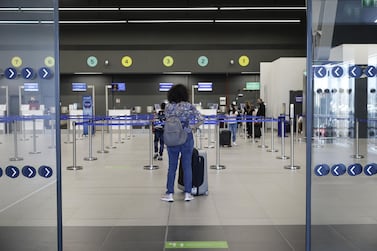 Passengers wait in line at the new terminal at Thessaloniki Makedonia Airport, operated by Fraport Greece, in Thessaloniki, Greece, on Wednesday, May 19, 2021. European Union governments agreed to allow quarantine-free travel for vaccinated tourists and visitors from countries deemed safe, paving the way for the resumption of hassle-free trans-Atlantic flights. Photographer: Konstantinos Tsakalidis/Bloomberg