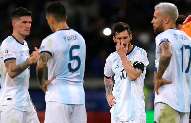 Argentina's Lionel Messi, second right, reacts after the match, a 1-1 draw. Reuters