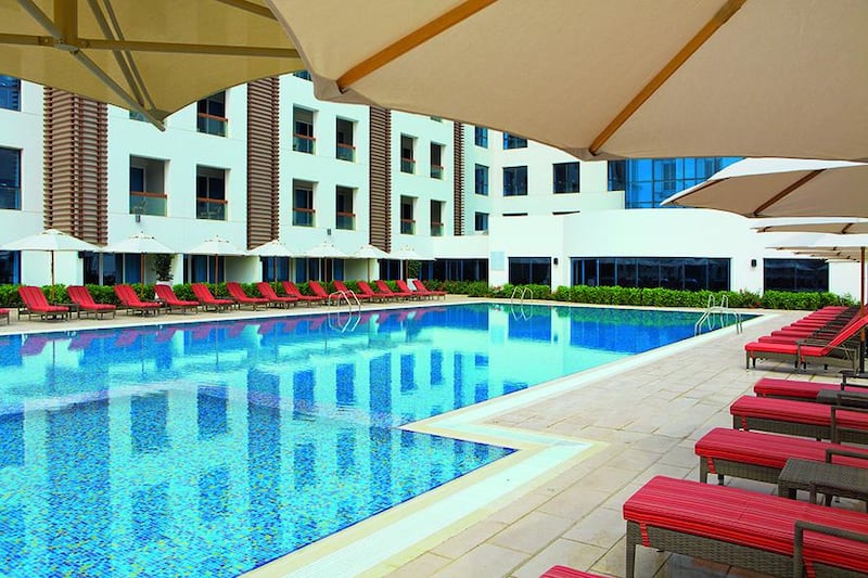The swimming pool at the Hili Rayhaan by Rotana. Courtesy Rotana Hotels