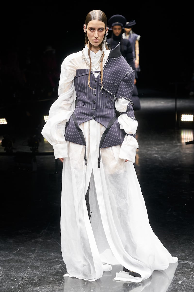 Men's suiting is taken apart and made into a corset at Jean Paul Gaultier.
