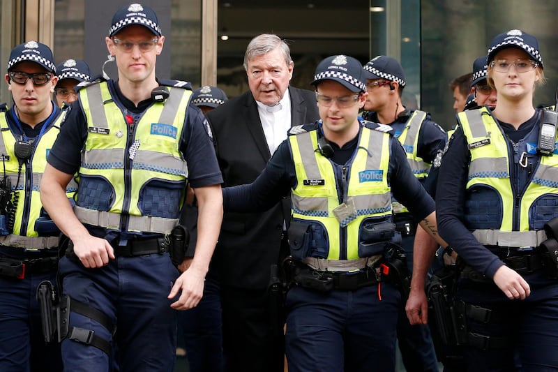 epaselect epa06705646 Australia's most senior Catholic Cardinal George Pell (C) departs the County Court of Victoria in Melbourne, Australia, 02 May 2018. Cardinal Pell will stand trial on charges of sexual assault dating back more than 20 years.  EPA/DANIEL POCKETT NO ARCHIVING AUSTRALIA AND NEW ZEALAND OUT