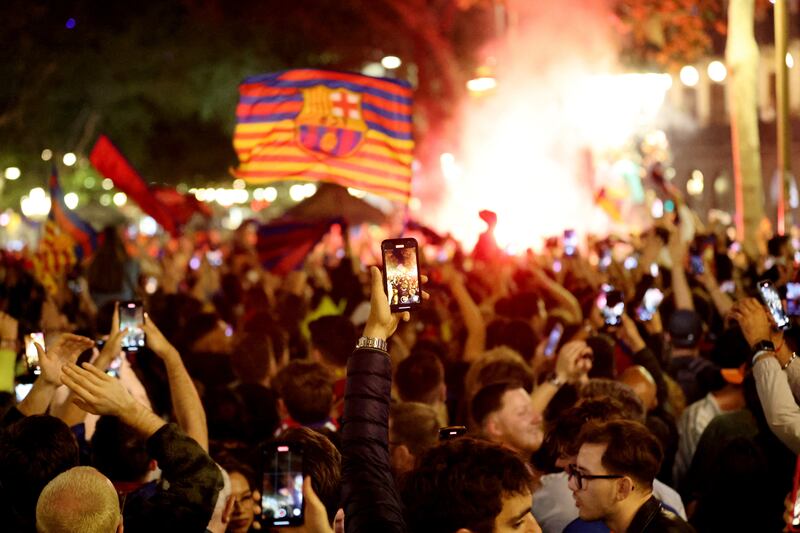 Barcelona fans celebrate in La Ramblas after winning La Liga. Reuters