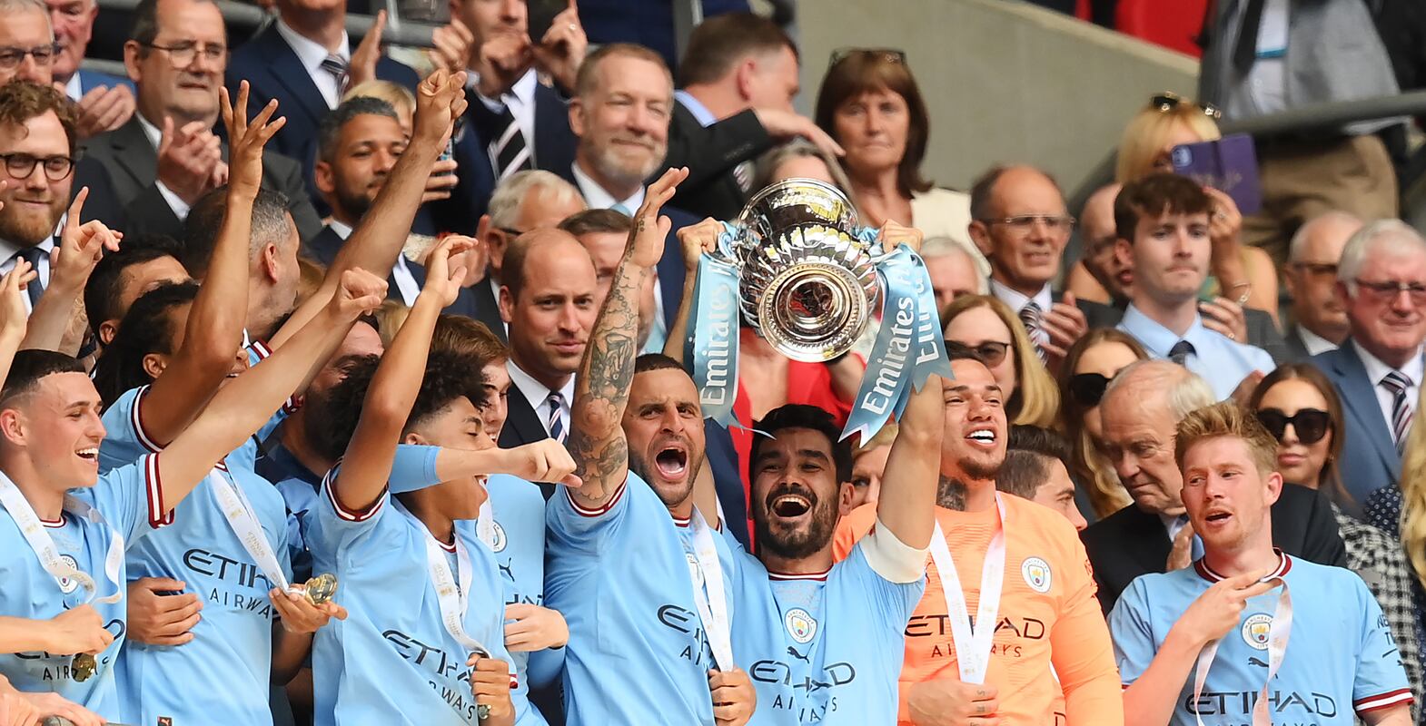 LONDON, ENGLAND - JUNE 03: Ilkay Guendogan of Manchester City lifts the Emirates FA Cup trophy after the team's victory in the Emirates FA Cup Final between Manchester City and Manchester United at Wembley Stadium on June 03, 2023 in London, England. (Photo by Shaun Botterill / Getty Images)