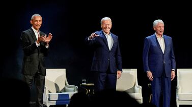 US President Joe Biden and former presidents Barack Obama and Bill Clinton at a campaign event in New York late on Thursday night. Reuters