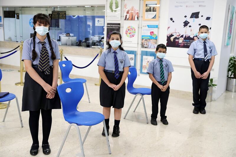 DUBAI, UNITED ARAB EMIRATES , September 21 – 2020 :- Left to Right - Lana Fanar student of grade 7, Noor Nader student of grade 6, Mekaeel Mehdi student of grade 3 and Abdullah Kasim student of grade 7 written the Digital Quarantine Diaries of 400 pages  at The Westminster School in Al Qusais in Dubai.  (Pawan Singh / The National) For News. Story by Sarwat