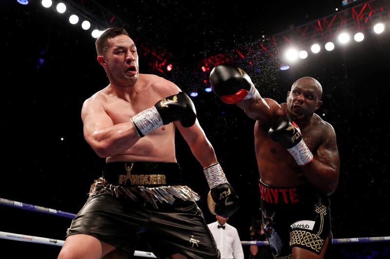 Joseph Parker dodges a punch from Dillian Whyte. Reuters