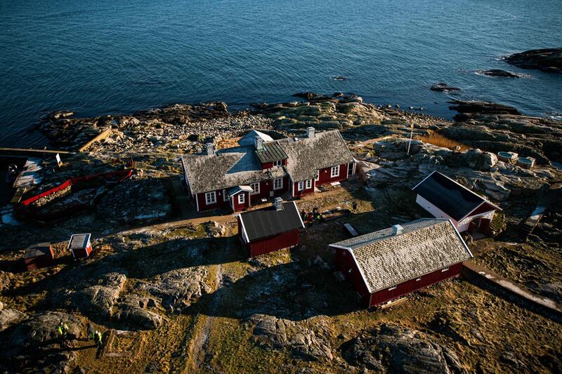 An aerial view shows a hotel built around the the Pater Noster lighthouse on the island of Hamneskar, off Sweden's west coast. AFP