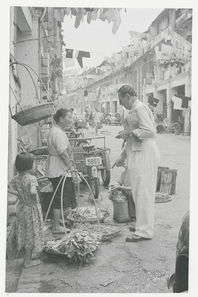 Singapore: Street scene with vendor selling vegetables in Chinese quarters.