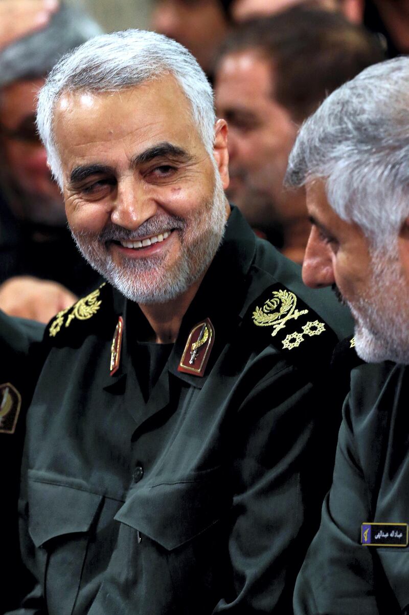 A handout picture released by the official website of the Centre for Preserving and Publishing the Works of Iran's supreme leader Ayatollah Ali Khamenei, shows the commander of the Iranian Revolutionary Guard's Quds Force, Gen. Qassem Suleimani, attending a meeting of Revolutionary Guard's commanders with Khamenei in Tehran on September 16, 2015. Khamenei warned commanders of the elite Revolutionary Guards to be on alert for "political and cultural" infiltration by the United States.  AFP PHOTO / HO / KHAMENEI.IR   ===  RESTRICTED TO EDITORIAL USE - MANDATORY CREDIT - "AFP PHOTO / HO / KHAMENEI.IR" - NO MARKETING NO ADVERTISING CAMPAIGNS - DISTRIBUTED AS A SERVICE TO CLIENTS === / AFP PHOTO / KHAMENEI.IR / -