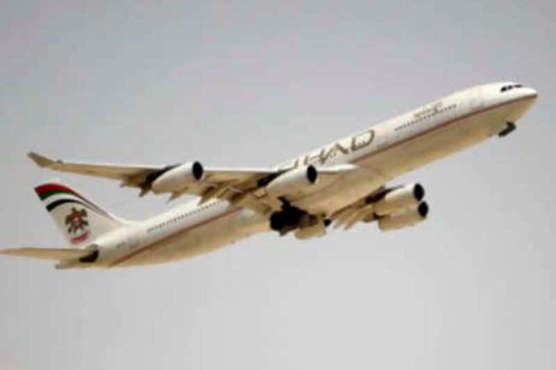 ABU DHABI, UNITED ARAB EMIRATES - August 24, 2008: Etihad airplanes at Abu Dhabi International Airport.

( Ryan Carter / The National )

