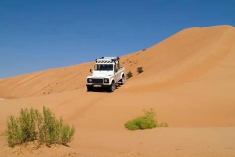 The Land Rover Defender proves to be a nimble navigator of soft sand - Paolo Rossetti for The National