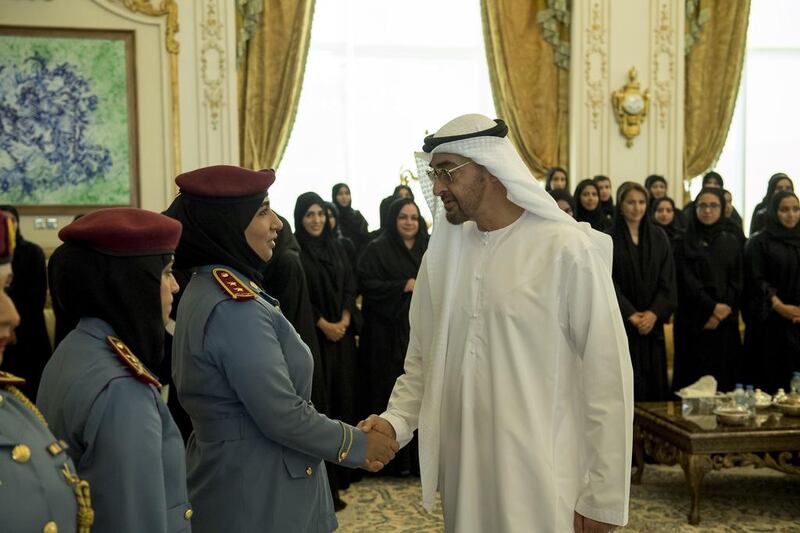 Sheikh Mohammed bin Zayed, Crown Prince of Abu Dhabi and Deputy Supreme Commander of the Armed Forces, greets a member of the Armed Forces on the occasion of Emirati Women’s Day, during a Sea Palace barza.  Rashed Al Mansoori / Crown Prince Court - Abu Dhabi