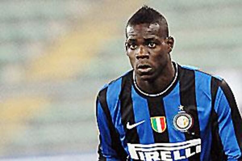 Inter Milan's Mario Balotelli threw his gloves on the ground and was slow to get up.