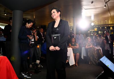 Lea Salonga with her trophy at the Time100 Impact Awards. Getty