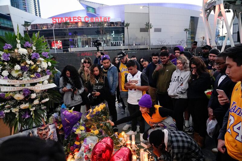 Mourners gather in Microsoft Square near the Staples Center to pay respects to Kobe Bryant after a helicopter crash killed the retired basketball star, in Los Angeles, California, U.S. REUTERS