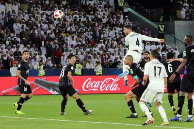 epa07245625 Sergio Ramos of Real Madrid scores a goal during FIFA Club World Cup 2018 final match between Real Madrid and Al Ain FC in Abu Dhabi, United Arab Emirates, 22 December 2018.  EPA/MAHMOUD KHALED