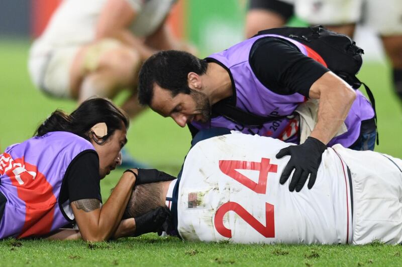 Will Hooley of the US receives medical attention during the Rugby World Cup Pool C match. Reuters
