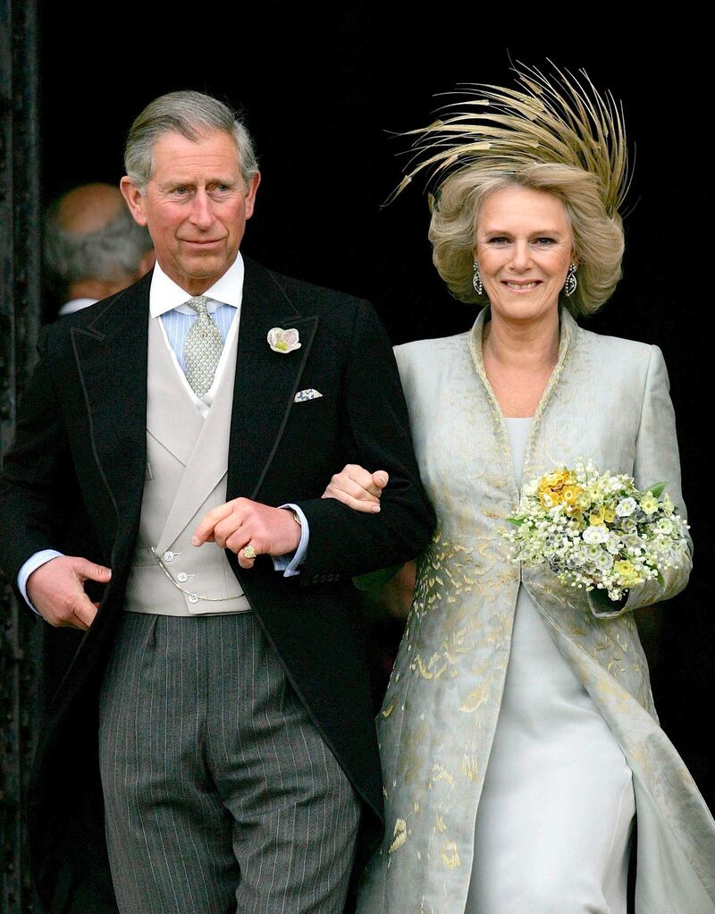 epa000409647 Prince Charles, the Prince of Wales, and Camilla the Duchess of Cornwall, leave St George's Chapel, Windsor, Saturday, 09 April 2005 following the blessing of their wedding.  EPA/ALASTAIR GRANT/POOL WPA ROTA POOL