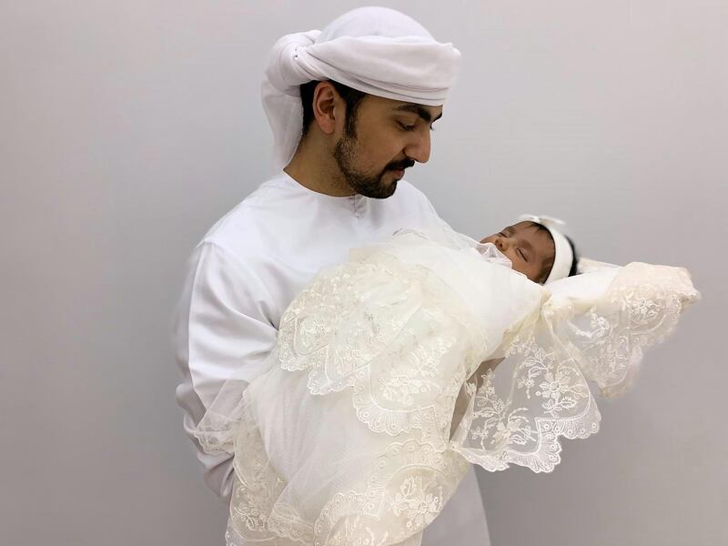Zeina Al Amiri, the youngest Emirati stranded abroad, returns home to her father in the UAE. Courtesy: Wam