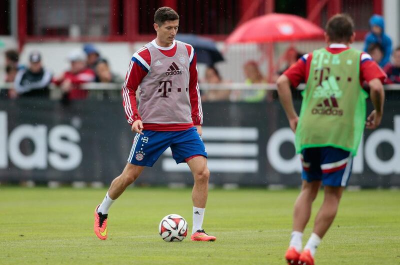 Robert Lewandowski, left, and Lucas Scholl of Bayern Munich shown during Wednesday's team training session in Munich, Germany. Johannes Simon / Bongarts / Getty Images