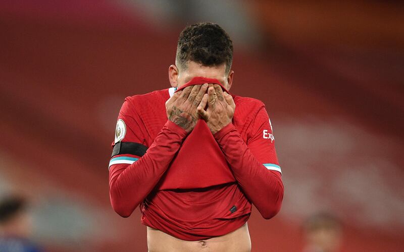 Liverpool's Roberto Firmino reacts after missing a scoring chance against Chelsea at Anfield on Thursday, March 4, 2021. AP