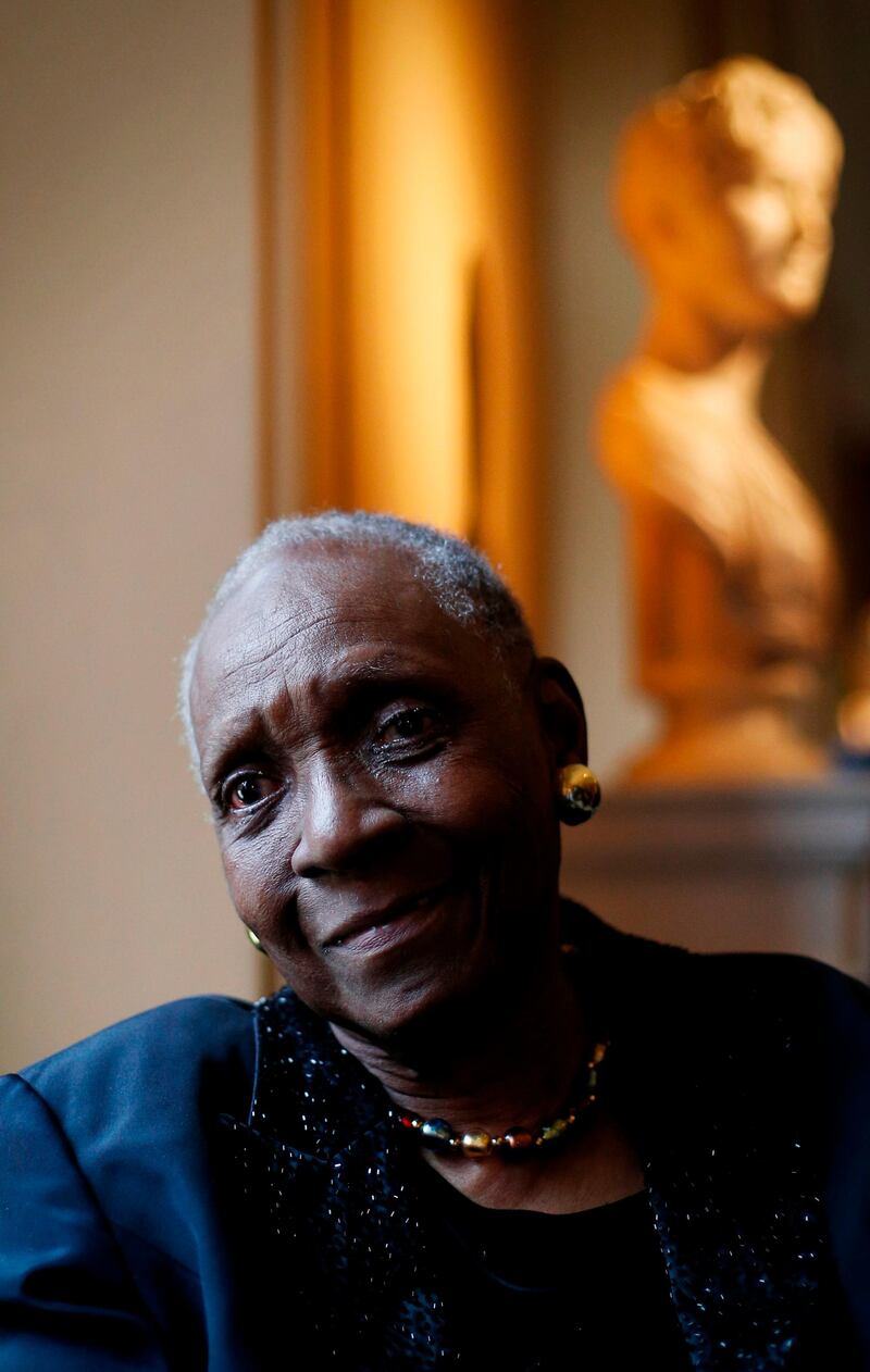 (FILES) In this file photo taken on May 19, 2015 Guadeloupe writer Maryse Conde poses for a photograph at the Victoria and Albert Museum in London. The Guadeloupian writer Maryse Conde won the "New Literature Prize" by the "New Academy" on October 12, 2018, in response to the #MeToo wave that led to a one-year postponement of the Nobel prize in literature.  / AFP / Adrian DENNIS
