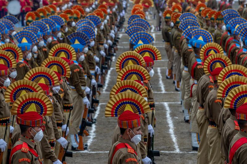 Indian paramilitary soldiers and policemen attend Indian Republic day parade in Srinagar, Indian controlled Kashmir. AP