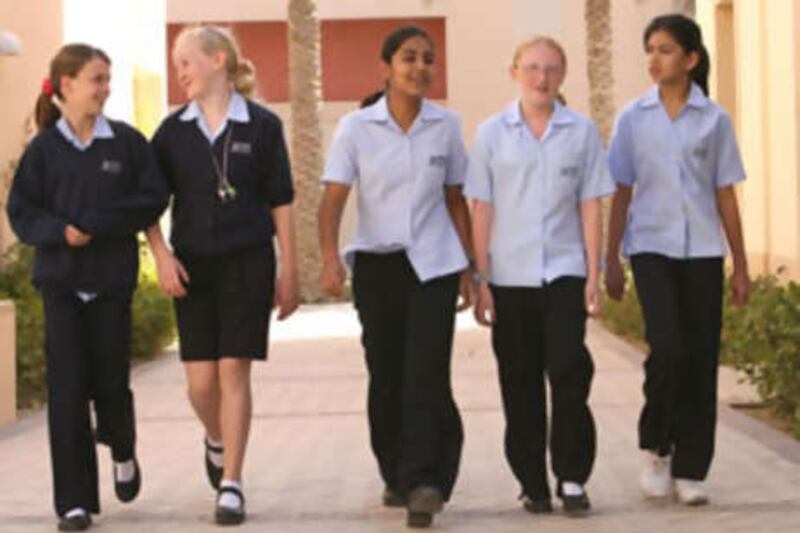 Pupils walking between classes at the Jumeirah English Speaking School at Arabian Ranches, Dubai.