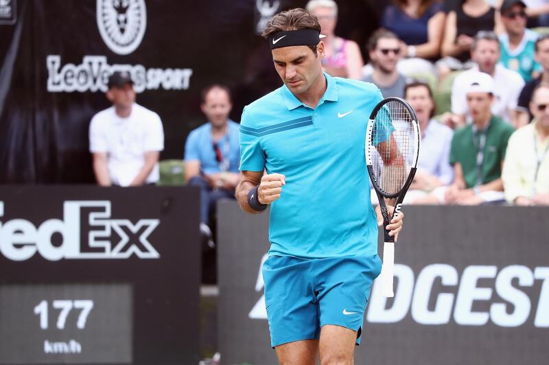 STUTTGART, GERMANY - JUNE 17:  Roger Federer of Switzerland celebrates a point during the foinal match against Milos Raonic of Canada during day 7 of the Mercedes Cup at Tennisclub Weissenhof on June 17, 2018 in Stuttgart, Germany.  (Photo by Alex Grimm/Getty Images)