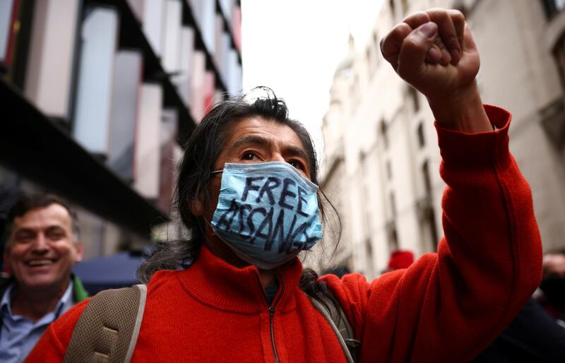 A supporter of Assange shouts outside the Old Bailey. Reuters