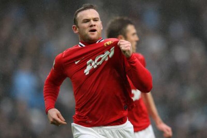 MANCHESTER, ENGLAND - JANUARY 08:  Wayne Rooney of Manchester United celebrates scoring the opening goal during the FA Cup Third Round match between Manchester City and Manchester United at the Etihad Stadium on January 8, 2012 in Manchester, England.  (Photo by Alex Livesey/Getty Images) *** Local Caption ***  136555624.jpg