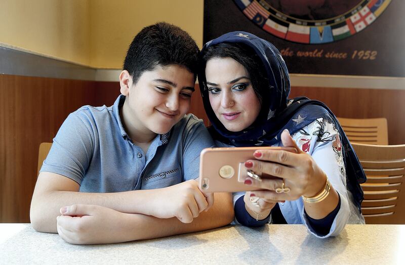 Sharjah, 26, August, 2017: Raldah Bourhan from Syria pose with his 12year old  son Elaf during the interview in Sharjah. ( Satish Kumar /  For The National )  Story by Nawal Al Ramahi