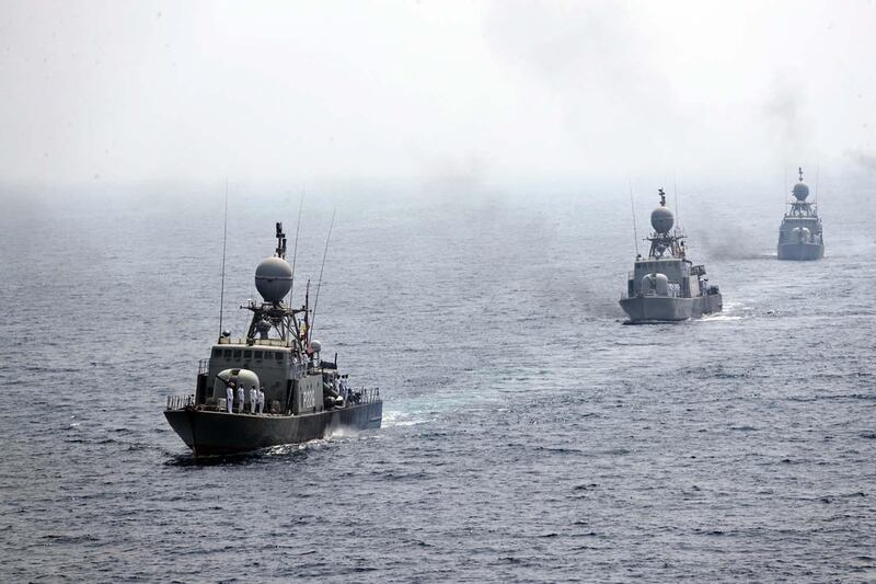 Iranian navy warships parade during the last day of military exercise in Gulf. EPA, HO Iranian military