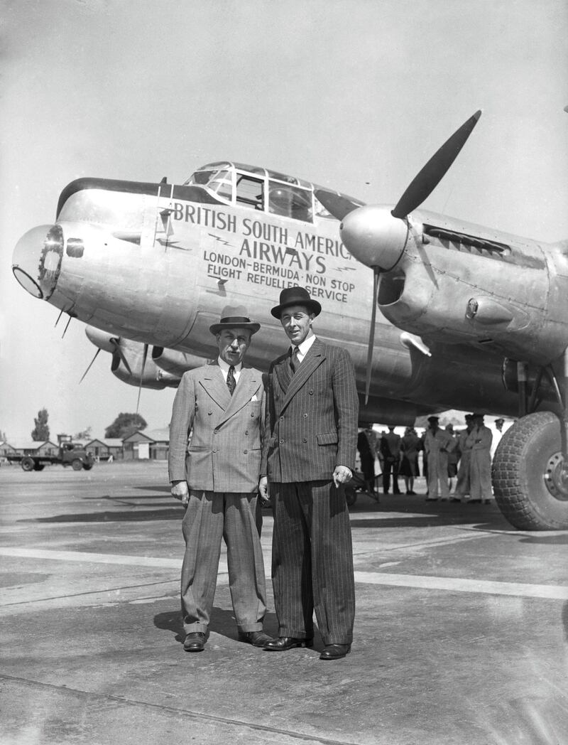 Aviation pioneer Sir Alan Cobham (1894 - 1973, left) with Air Vice Marshal Donald Clifford Tyndall Bennett (1910 - 1986), Chief Executive of British South American Airways, in front of a converted Lancaster bomber at Heathrow Airport, UK, 28th May 1947. Bennett is about to fly the aircraft non-stop to Bermuda, to test the mid-air flight refuelling system developed by Cobham before the war. (Photo by J. Wilds/Keystone/Hulton Archive/Getty Images)