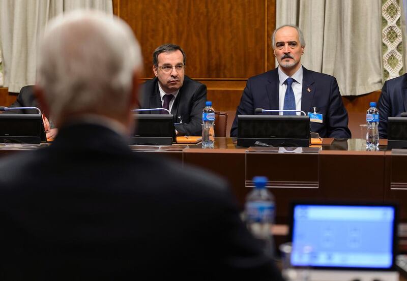 Syrian ambassador to UN and head of the government delegation Bashar Al Jaafari (R) faces UN envoy to Syria Staffan de Mistura at the opening of Syrian peace talks in Geneva on January 29, 2016. Fabrice Coffrini/AFP 

