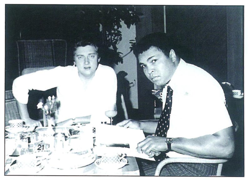Muhammed Ali is seen with Ian Fairservice, Managing Partner and Group Editor of Motivate Publishing in Dubai. Photo Courtesy: What's On Magazine Archives